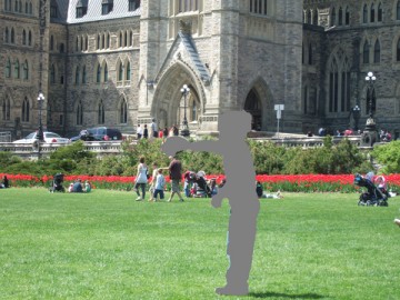 Our eldest son is playing catch on the lawn in Parliament Hill in Ottawa.