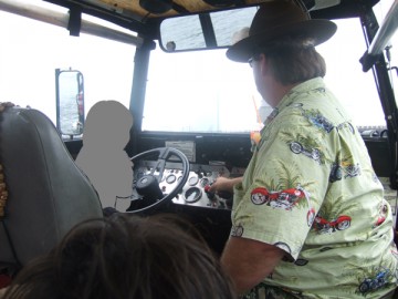 In the bus of Boston Duck Tours. Our second son, who is driving in the driving seat.