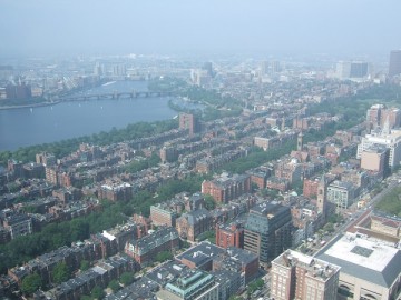The city of Boston and Charles River viewed from the top of Prudential Tower.