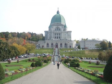 Saint Joseph's Oratory in Montreal. There is a green lawn in front of it.