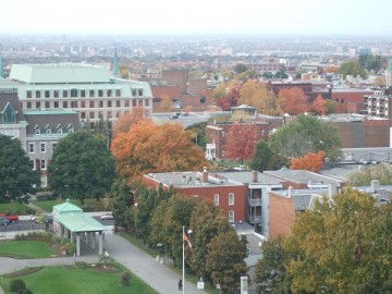The scenery of Côte-des-Neiges from the Oratory. The red brick buildings and red leaves.